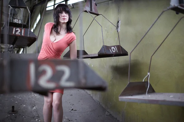 Woman at abandoned factory — Stock Photo, Image