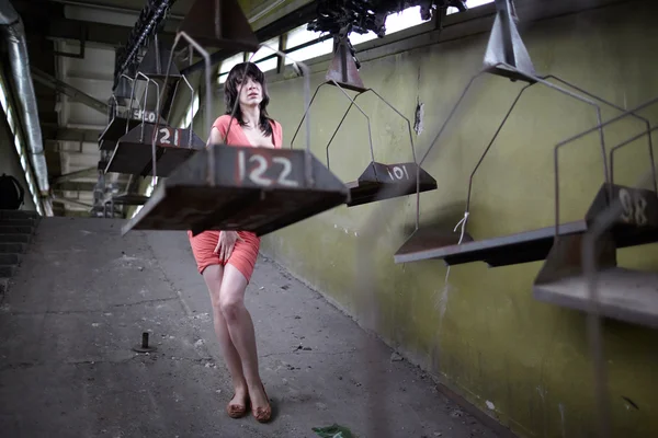 Woman at abandoned factory — Stock Photo, Image