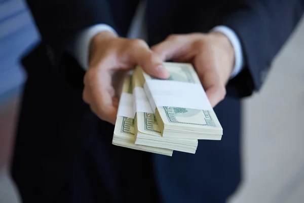 Money in male hands — Stock Photo, Image