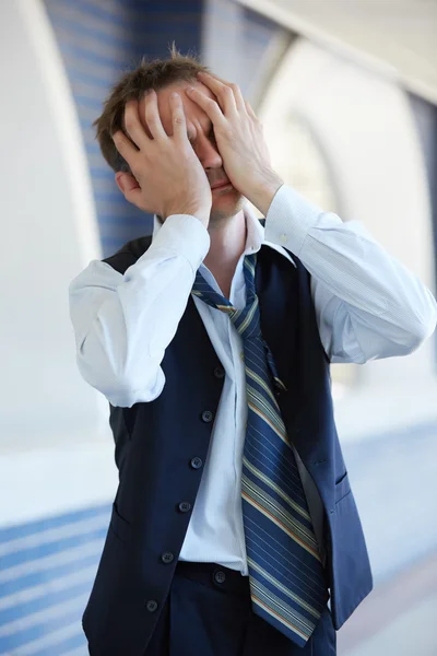 Upset businessman in despair Stock Image