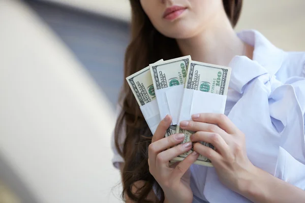 Female hands with dollars Stock Picture