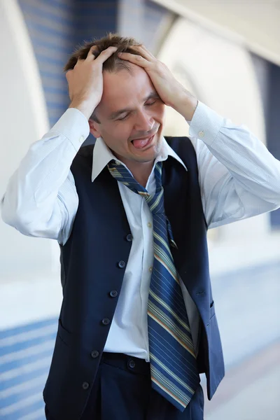 Upset businessman in despair Stock Image