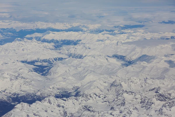 Uitzicht vanaf vliegtuig naar bergen — Stockfoto