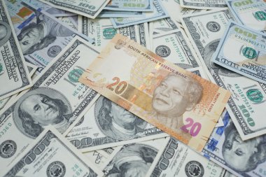 twenty rand against the background of dollars
