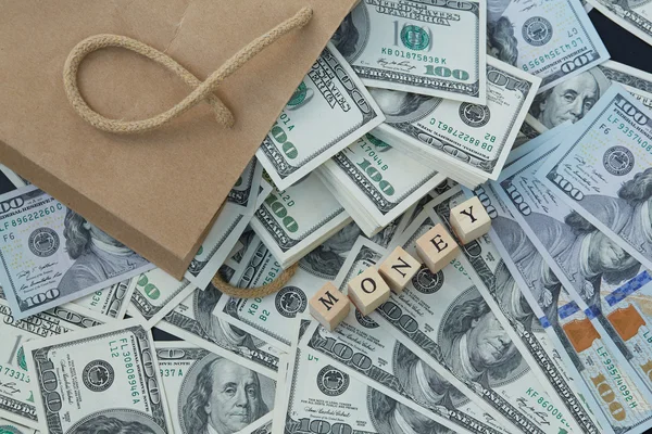 Houten blokken met inscriptie geld en geld — Stockfoto