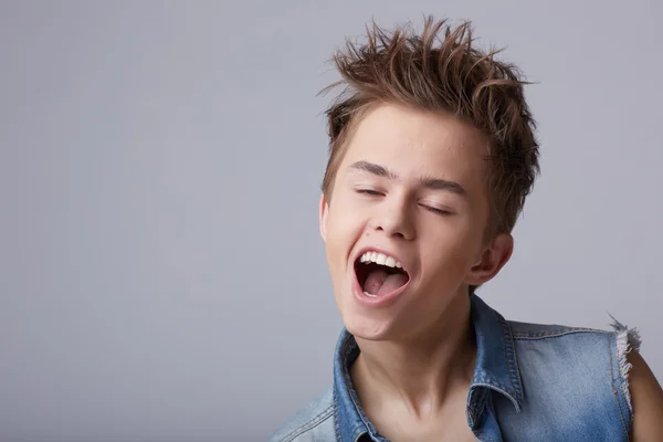 Guy in denim vest — Stock Photo, Image