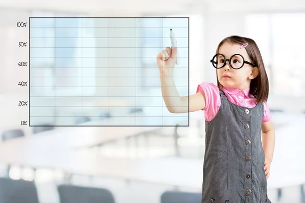 Cute little girl wearing business dress and drawing on empty graph. Office background. — Stock Photo, Image