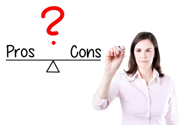 Young business woman writing pros and cons compare on balance bar. — Stock Photo, Image