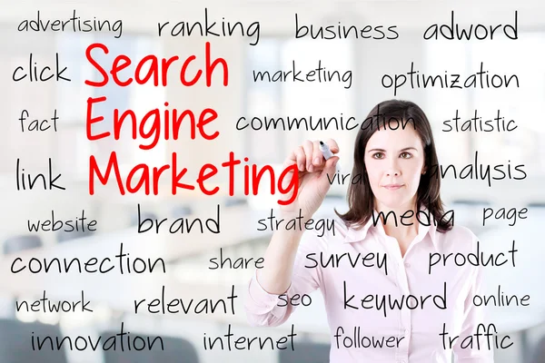 Young business woman writing search engine marketing concept. — Stock Photo, Image