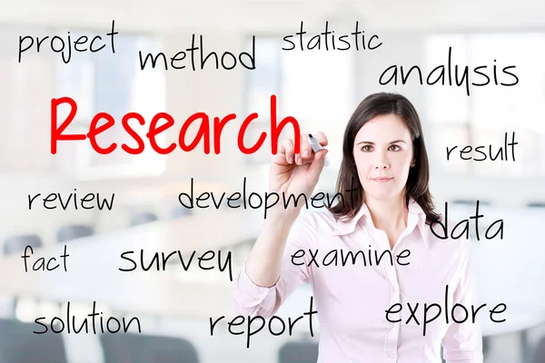 Young business woman writing research concept. — Stock Photo, Image