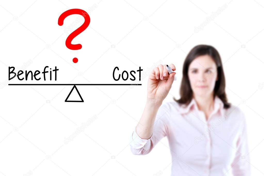 Young business woman writing cost and benefit compare on balance bar.