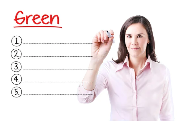 Деловая женщина пишет чистый зеленый список. Изолированные на белом . — стоковое фото