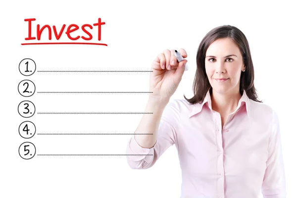 Mulher de negócios escrevendo lista Invest em branco. Isolado em branco . — Fotografia de Stock