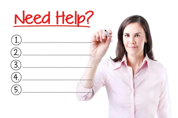Mujer de negocios escribiendo en blanco ¿Necesitas ayuda? Lista. Aislado sobre blanco . — Foto de Stock