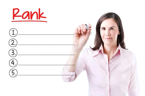 Business woman writing blank Rank list. Isolated on white. — Stock Photo, Image