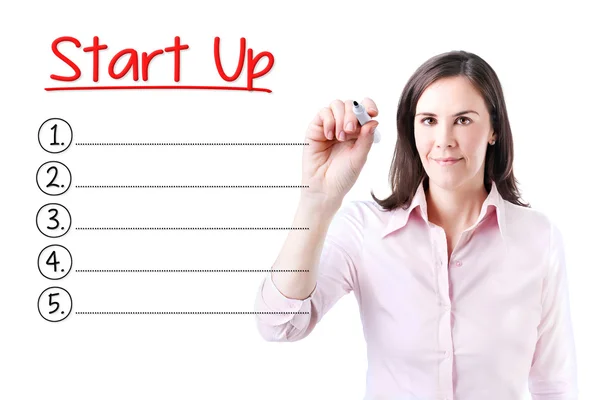 Business woman writing blank Start-Up list. Isolated on white. — Stock Photo, Image