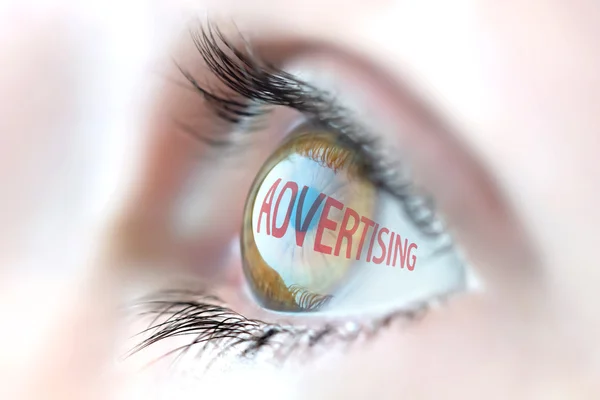 Advertising reflection in eye. — Stock Photo, Image