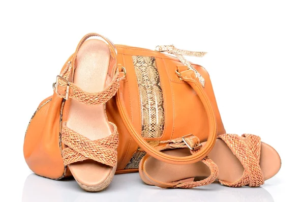 El çantaları ve turuncu renk bir çift yaz kadın sandalet