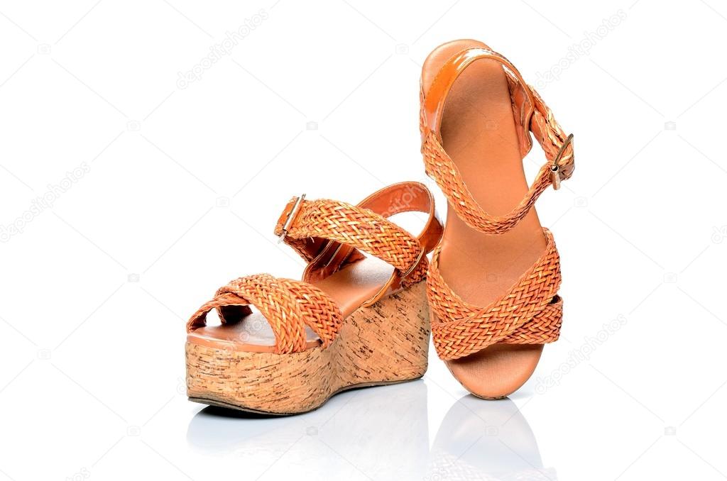Female summer shoes, sandals orange platform on a white background