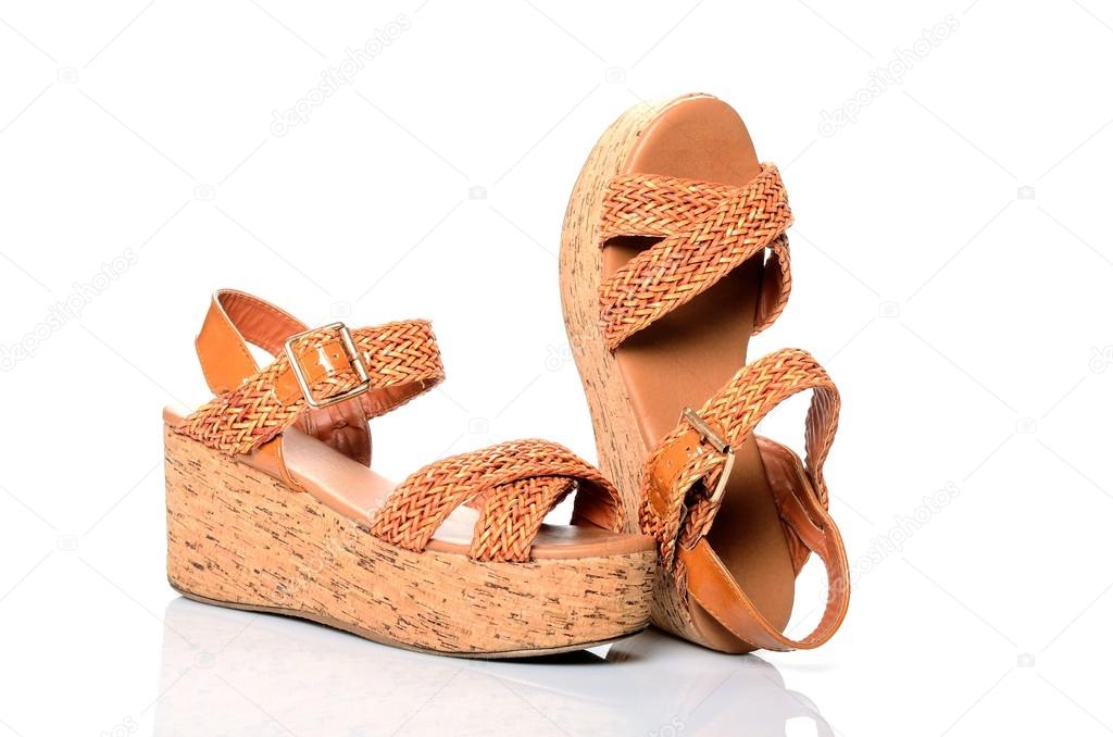 Female summer shoes, sandals orange platform on a white background