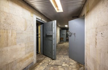 Protective doors of abandoned Bank vaults clipart