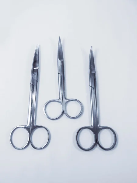 Surgical instruments on white — Stock Photo, Image