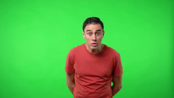 Man receiving good news. Chroma green background. — Stock Video