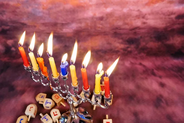 Jewish holiday Hanukkah creative background with menorah. View from above focus on . — Stock Photo, Image