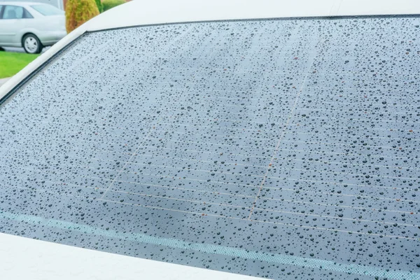 Colorful waterdrops on a steamy window — Stock Photo, Image