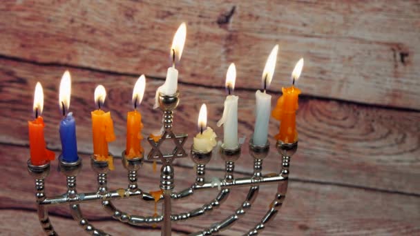 Jewish holiday Hanukkah creative background with menorah. View from above focus on . — Stock Video