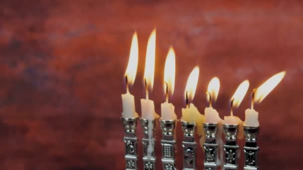 Jewish holiday Hanukkah creative background with menorah. View from above focus on . — Stock Video