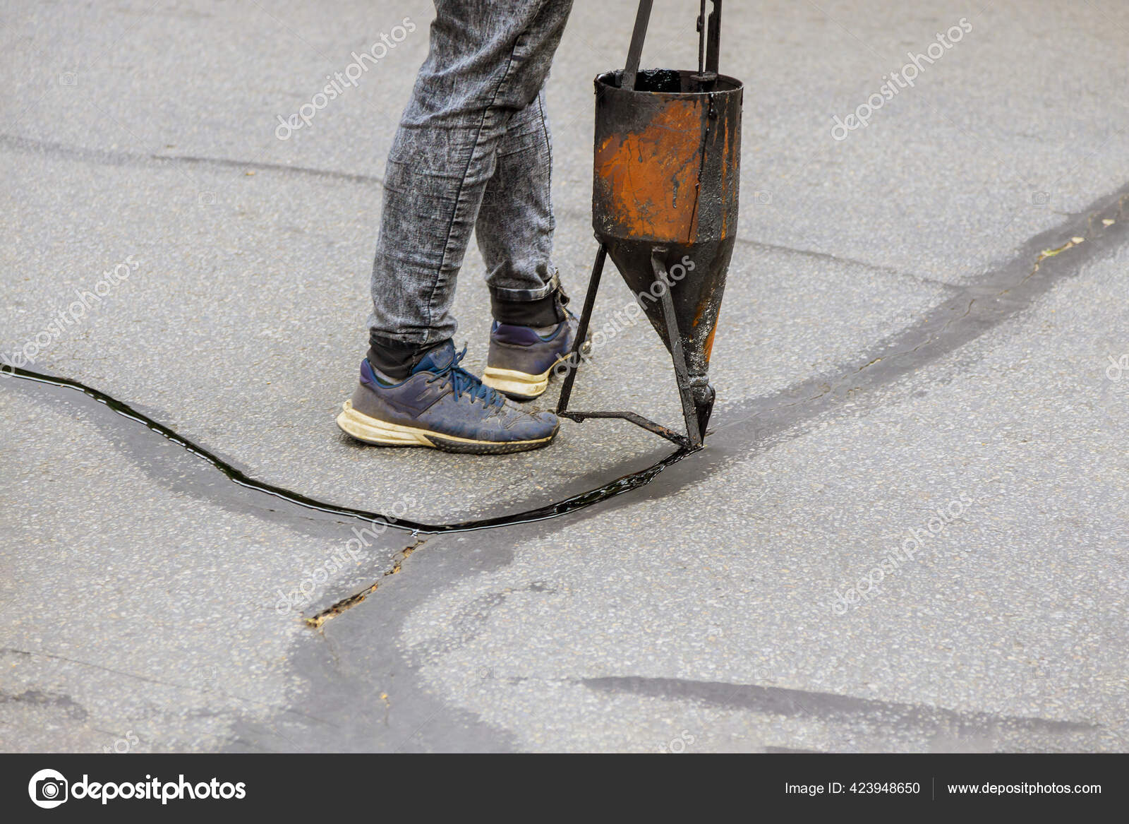 Workers Restoration Work Sealing Cracks Applying Liquid Sealer Asphalt