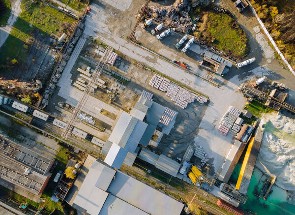 Aerial view on factory for the production of reinforced concrete piles for pouring concrete