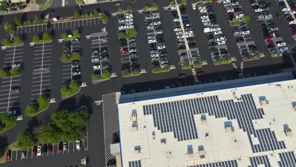 The road and infrastructure bridge on of parking lot with colorful cars near on shopping center a skyscraper skylines in Philadelphia city downtown of in PA USA — Stock Video