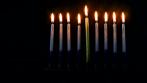 Hebrew Menorah of Hanukkah with burning candles is traditional symbol for holiday Jewish — Stock Video