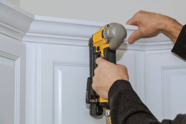 Worker Using Portable Air Gun Nail Nailing Crown Moldings New — Stock Photo, Image