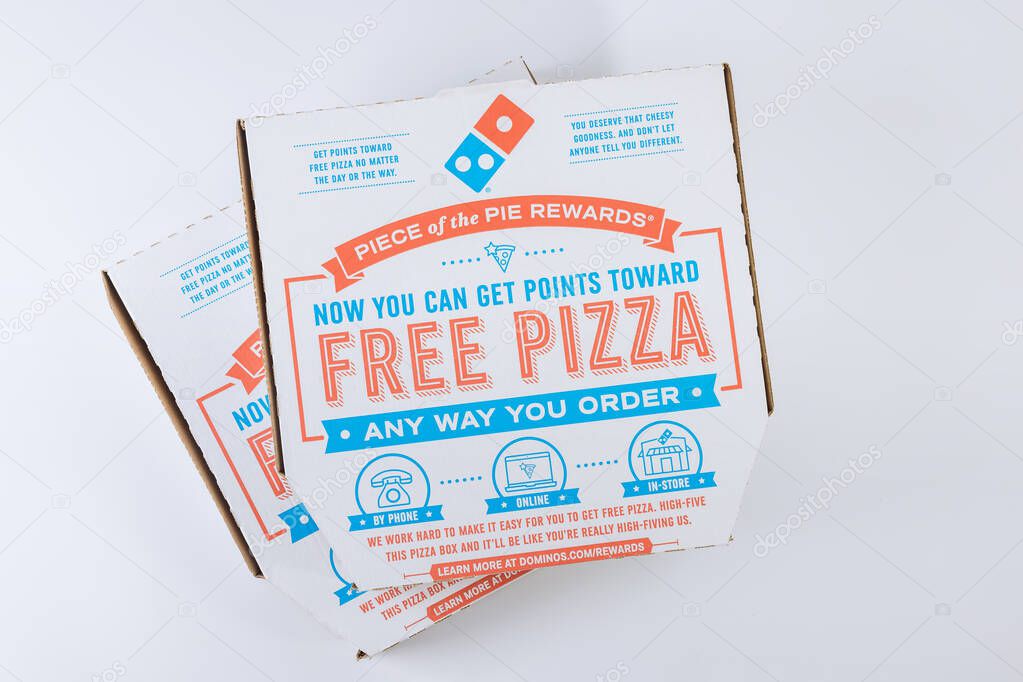 22 JANUARY 21 New York US 2021: American pizza with Dominos Pizza logo of take out boxes on a table
