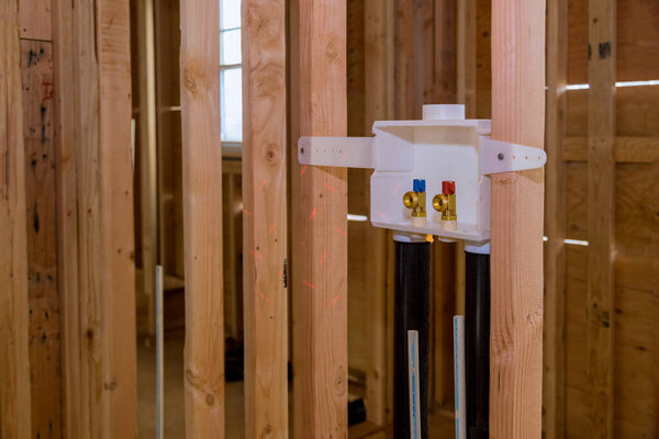 Installation of a laundry outlet boxes in a new house for connection of water to the washing machine