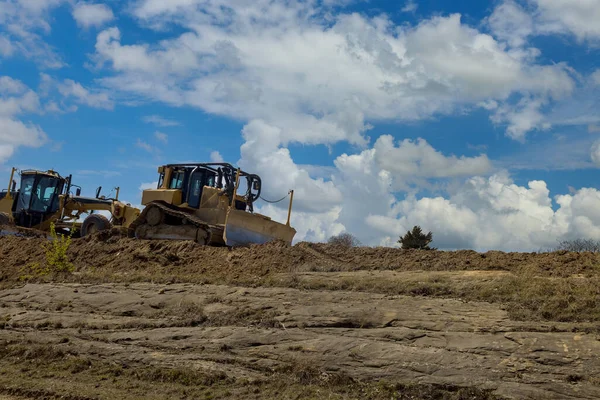 Las Excavadoras Niveladoras Carretera Que Trabajan Obra Construcción Una Nueva — Foto de Stock