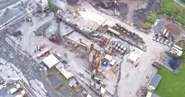 Open-pit iron ore mining, a big mining truck at work, working in a quarry in open cast — Stock Video