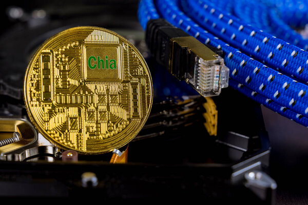 Chia cryptocurrency mining process with new green coin virtual money using SSD drive