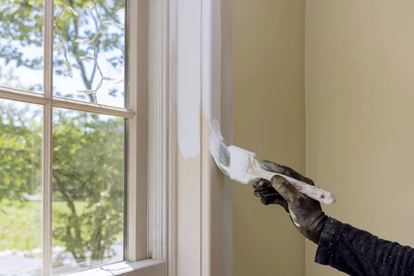 Handyman Paints Window Molding Frame Home Renovation — Stock Photo, Image