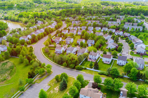 Aerial view of single family homes, a residential district near river in East Brunswick New Jersey USA