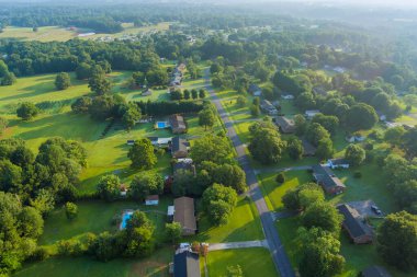 Aerial height on the residential streets landscape Boiling Springs town of small village in South Carolina USA clipart