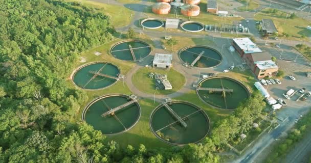 Sewage aerial view of a wastewater treatment processing plant sewage farm surrounding industrial — Stock Video