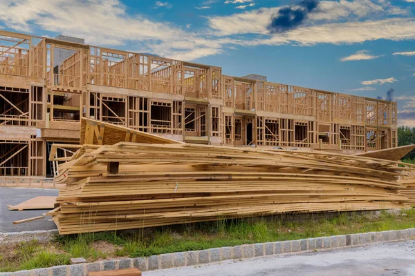 Stack of group in new construction materials for buildings on lumber material for construction