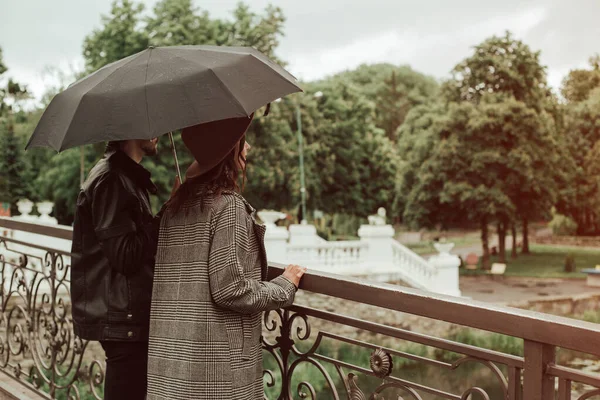 Back View Heterosexual Couple Standing Bridge City Park River Cloudy — Stock Photo, Image