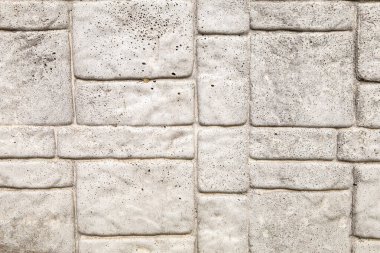 Makro çekim taş beton döşeme dekoratif tasarım prefabrik duvar çitlerini, gri desenli arka planı kapatır. Metin yazma için boş alanı kopyalayan resim 