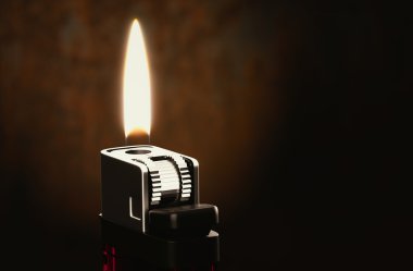 Lighters in the dark room clipart