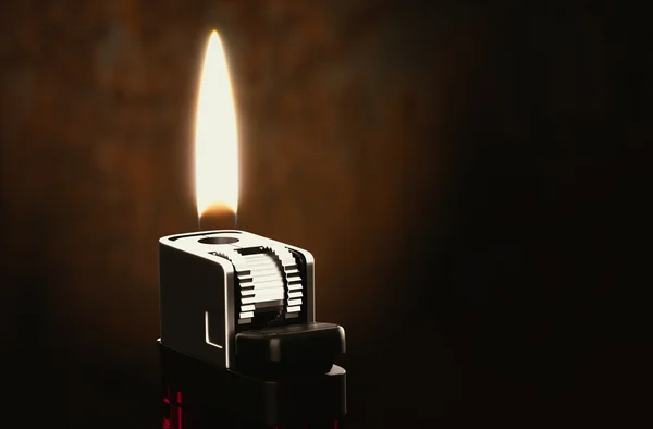 Lighters in the dark room — Stock Photo, Image